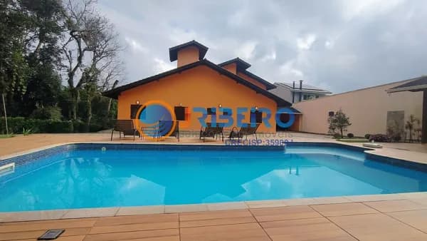 Casa em Condomínio Serra da Cantareira 4 dormitórios suítes amplo quintal com piscina, churrasqueira - SP.