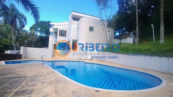 Casa em Condomínio 5 dormitórios quintal com piscina, espaço gourmet, 9 vagas de garagem a venda na Serra da Cantareira em SP