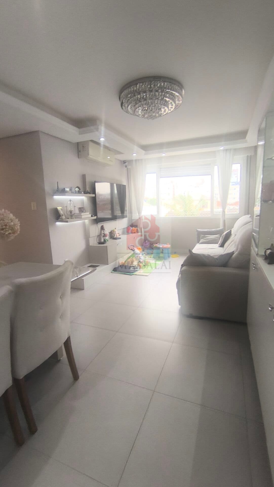 Apartamento de 3 dormitórios com garagem no Menino Deus