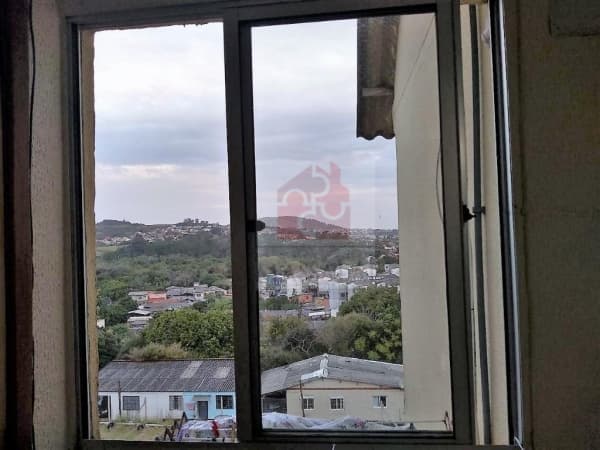 Apartamento de 2 dormitórios com estacionamento no Bairro Vila Nova em Porto alegre