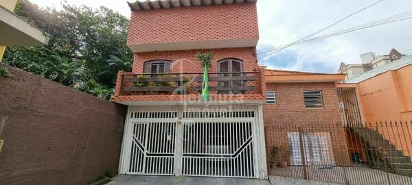 Casa à venda com 250 m², 2 dormitórios, banheiro, lavabo, sala de estar, cozinha, área de serviço e 2 vagas de garagem na Vila Formosa