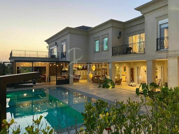 Casa 900m², 4 suítes e lazer completo no Campos do Conde