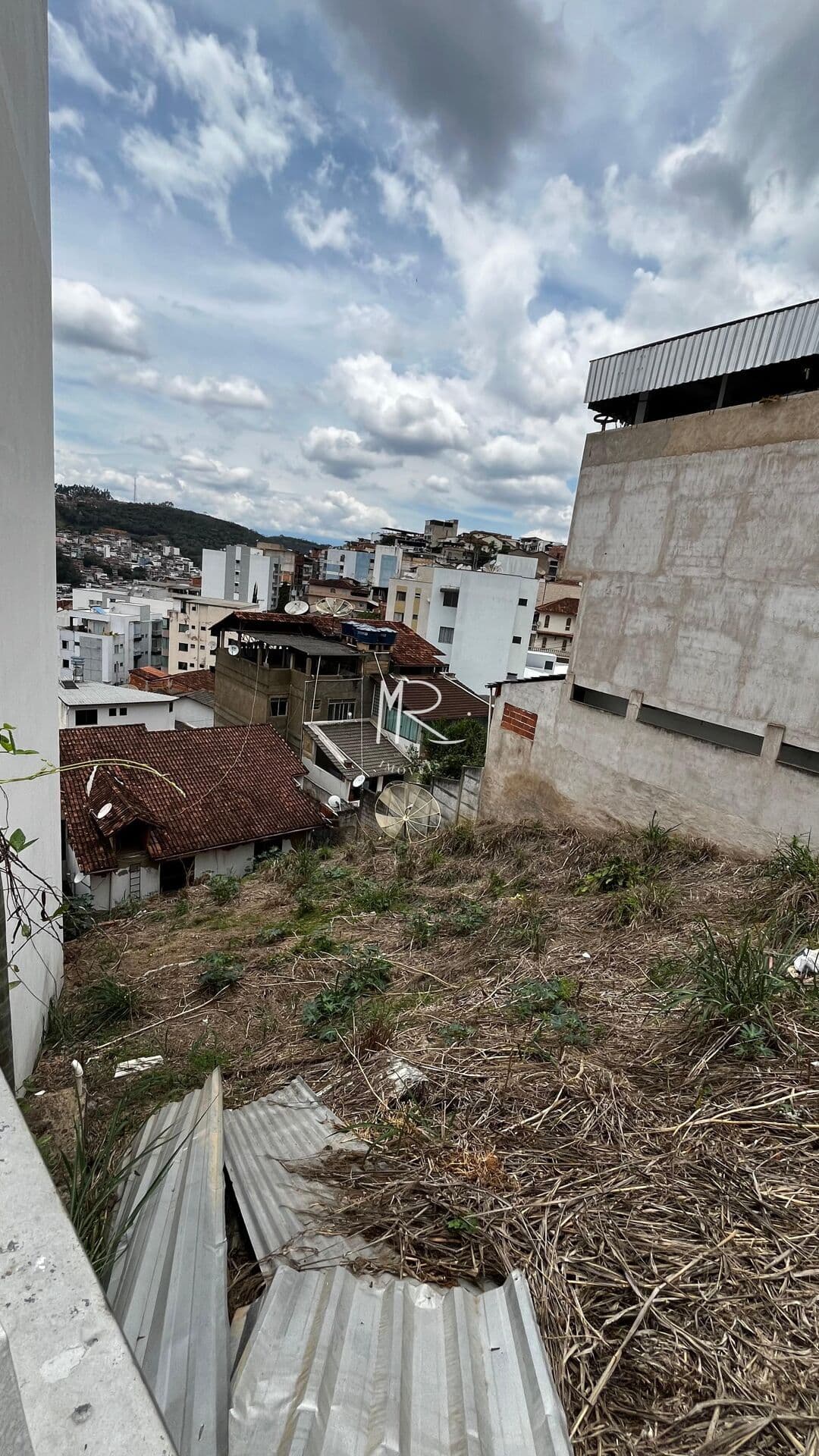 Lote com escritura no bairro Luciano Heringer