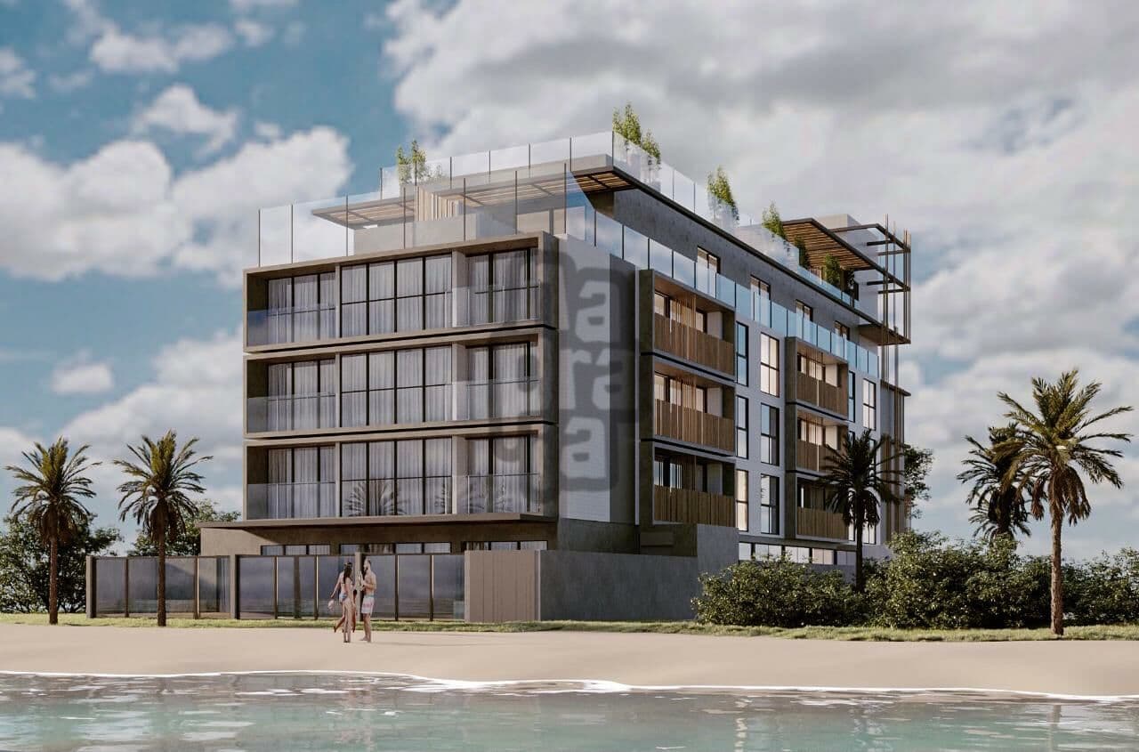 Flat com o pé na areia