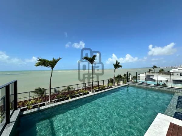 Apartamento de 02 quartos com móveis projetados e o pé na areia da praia do Bessa