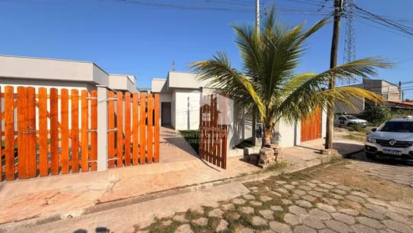 Casa em bairro de moradores