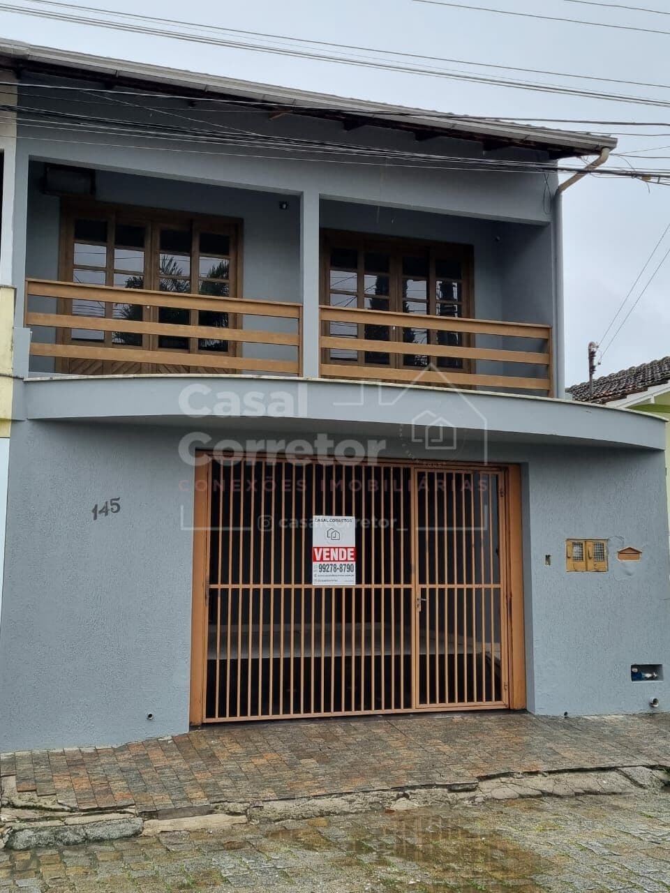 CASA NA SANTA TEREZINHA COM 4 DORMITÓRIOS E 2 VAGAS DE GARAGEM