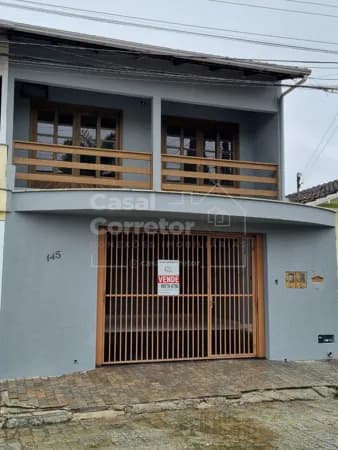 CASA NA SANTA TEREZINHA COM 4 DORMITÓRIOS E 2 VAGAS DE GARAGEM