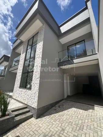 ENCANTADORA CASA DE 3 DORMITÓRIOS SENDO 1 SUÍTE