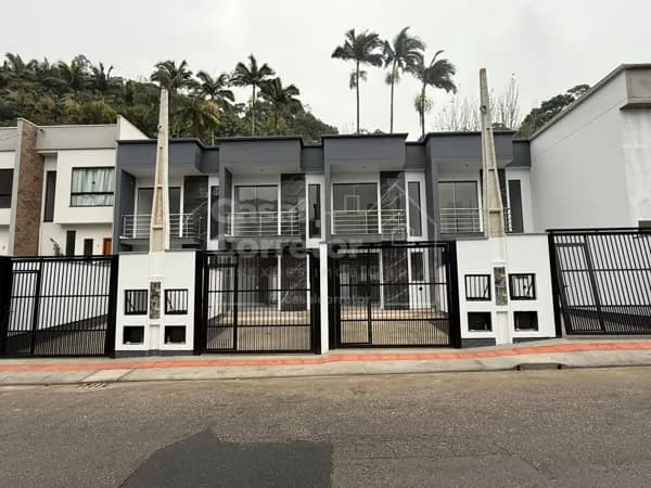 ACONCHEGANTE CASA DE 2 DORMITÓRIOS