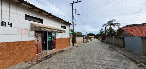 Terreno com 2 casas + sala comercial