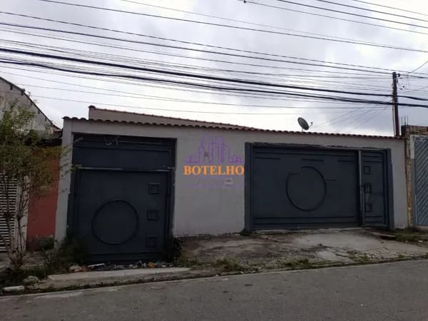 Casa térrea, ótima para construtora.