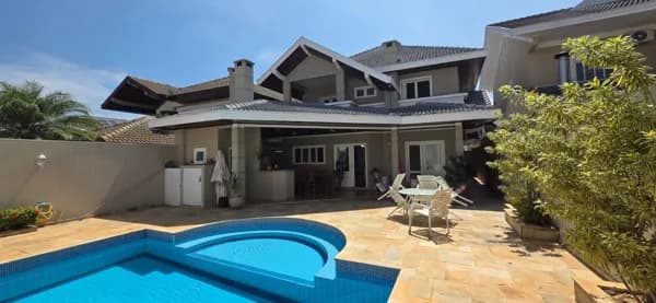 Casa em condomínio à venda – 5 suítes, piscina e área gourmet | Sunset Park – Jardim Aquarius | SJC