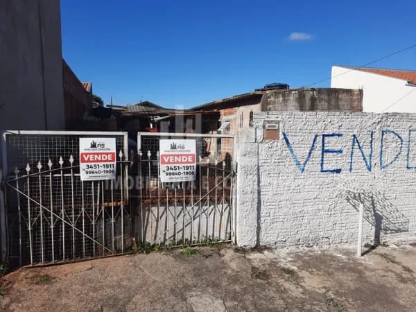 Terreno com Casa Inacabada