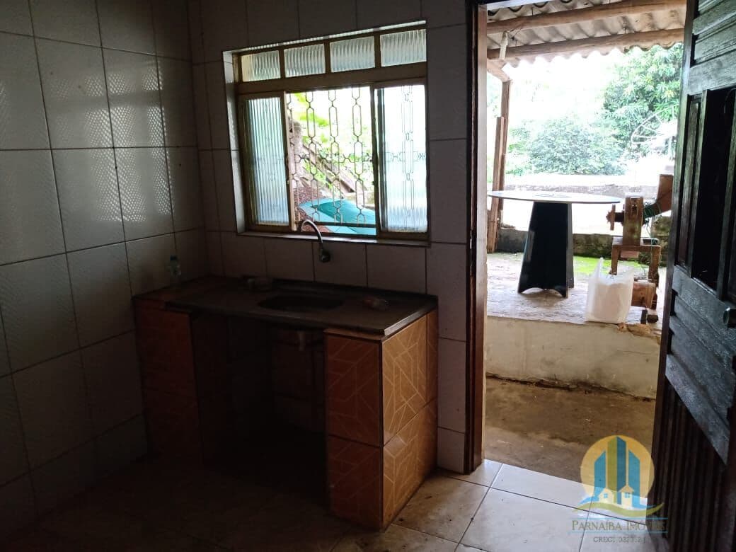Terreno com casa à venda na Chácara Solar III