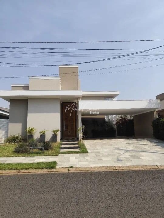Belíssima casa à venda com 3 suítes, sendo 1 suíte máster com closet e banheira, área Gourmet climatizada e piscina aquecida