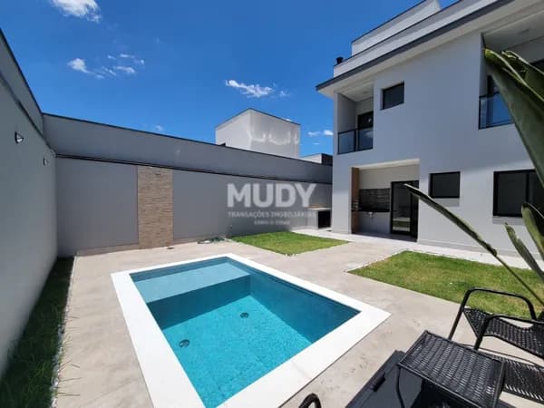 Sobrado em Condomínio na cidade de Indaiatuba/SP, com 3 suítes, piscina, varanda, por R$ 1.350.000,00