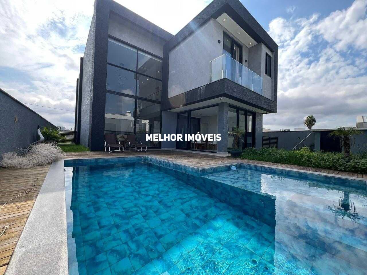 Locação Anual casa com 3 suítes, semi mobiliada, com área gourmet, piscina localizada em condomínio fechado.