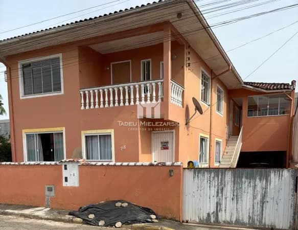 Casa com Sala Comercial
