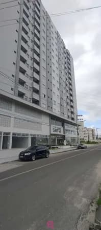 Próximo a Unisul novo em andar alto semi mobiliado