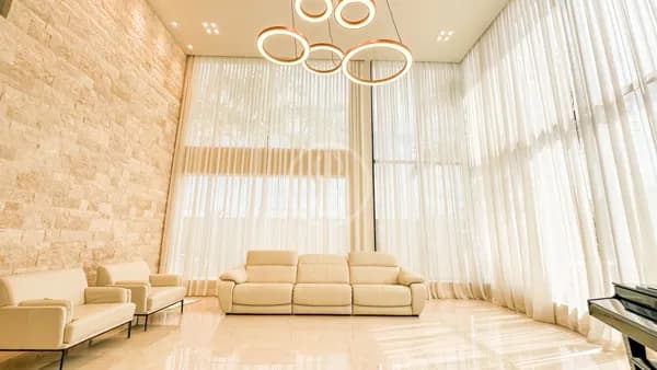 Casa triplex de 1.380 m² com subsolo à venda no condomínio Alphaville, Barra da Tijuca