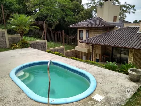 Casa 3 Dormitórios e Piscina no Centro de Viamão/RS. Bairro Dom Feliciano