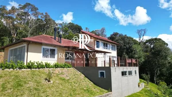 Comprar Belíssima casa com vista eterna para o por do sol – Condomínio Lago Negro – Rancho Queimado/SC