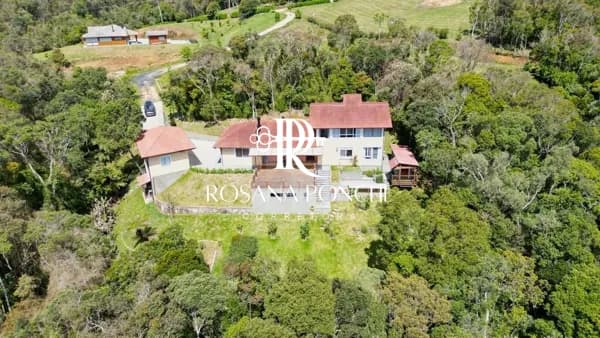 Comprar Belíssima casa com vista eterna para o por do sol – Condomínio Lago Negro – Rancho Queimado/SC