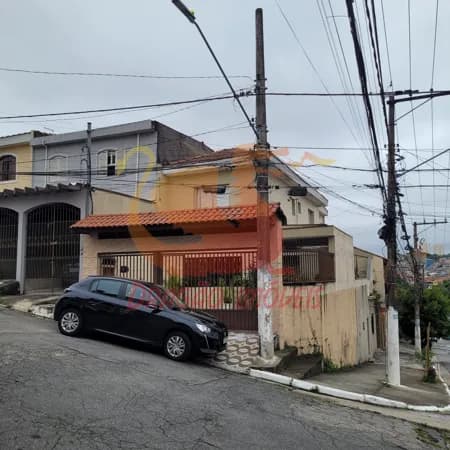 SOBRADO com 2 moradias - 2 vgs de garagem