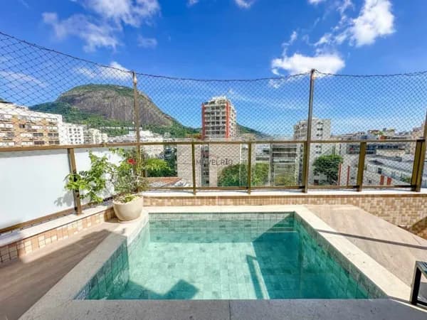 Cobertura de luxo no Jardim Botânico RJ – 234m², 4 suítes, piscina privativa e varanda gourmet envidraçada