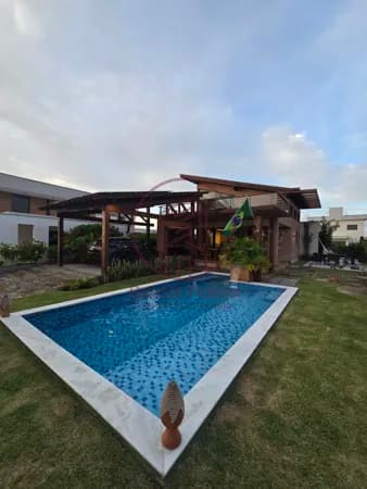 Casa mobiliada com 4 suítes e piscina à venda em Aldeia