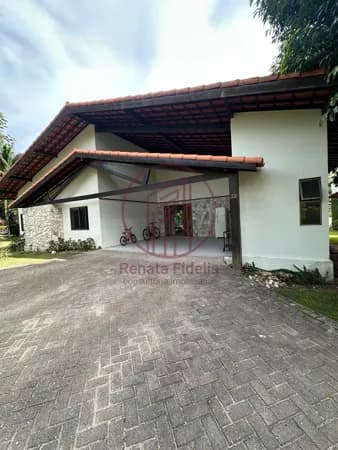 Casa á venda em Condomínio com móveis inclusos + terreno de 2 mil metros.