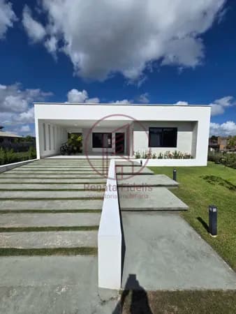 Vendo casa com 3 quartos e dependência em condomínio de Aldeia