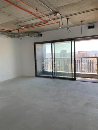 Sala comercial de 41m² no Tatuapé, com varanda e 1 vaga de garagem no prédio mais alto de São Paulo.