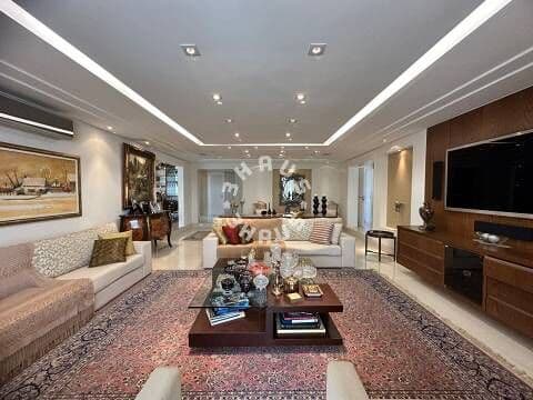 Apartamento mobiliado de 340m² com 4 suítes, mobiliado, 4 vagas de garagem e andar alto.