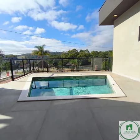 Casa em Condomínio Casa de Alto Padrão: 3 Suítes, Piscina e Espaço Gourmet