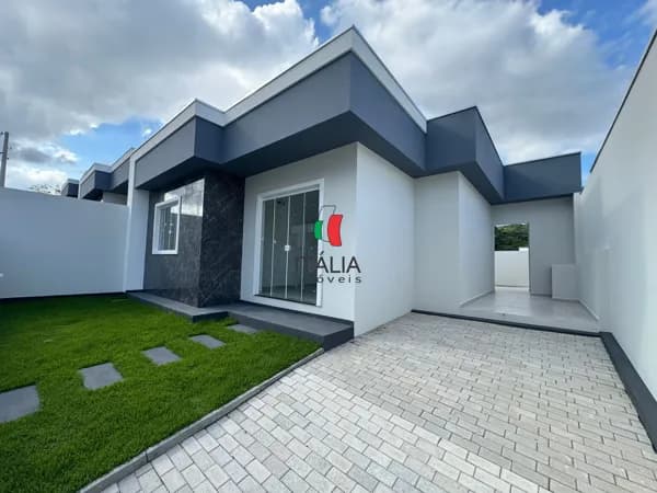 Casa à venda com 1 suíte, 2 dormitórios, sala e cozinha integradas, lavabo, lavanderia, garagem para 2 carros e ampla área de lazer. Conforto e modernidade para sua família