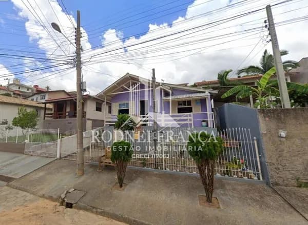 Casa de madeira no bairro de Oficinas