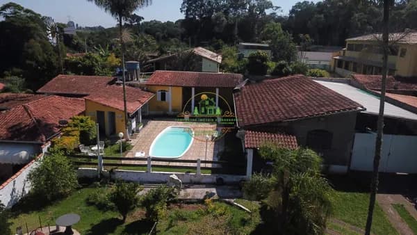 Chácara em condomínio fechado