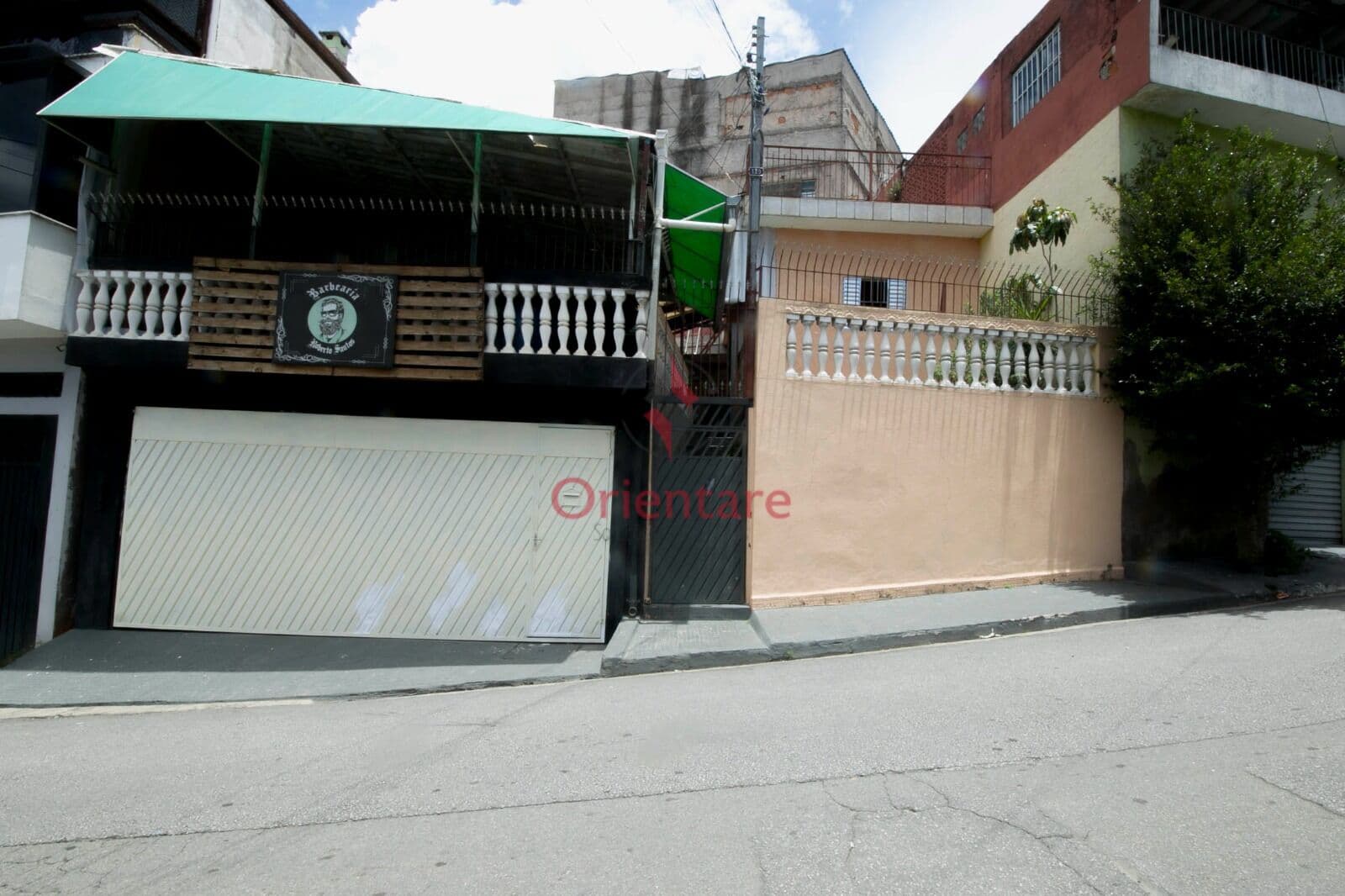 Terreno com 2 casas na Vila Brasilândia