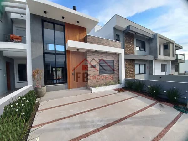 Casa terrea com tres dormitorios