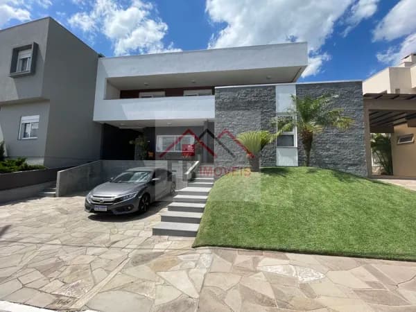 Casa Alto Padrão totalmente mobiliada em condomínio.
