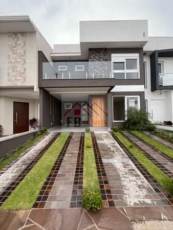 Casa à venda com 3 dormitórios, varanda e área gourmet completa!