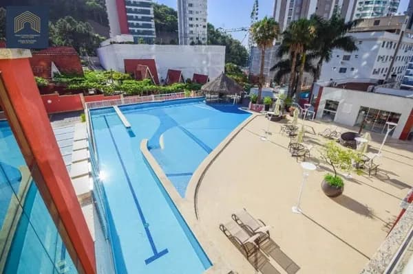 Apartamento em Home Club a 200 metros da praia