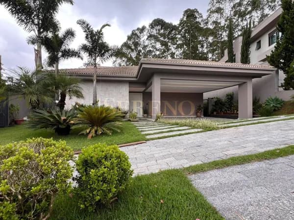 Casa Linear 04 suítes a venda, 300,32 m2, piso em madeira cumaru, armários de 1ª, ambientes integrados, espaço gourmet, pe direito duplo, piscina aquecida, 04 vagas, condomínio Flores, Lagoa dos ingleses, Alphaville, Nova Lima, MG – Brasil.