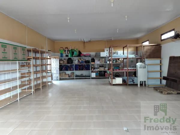 Casa com Sala comercial em Laguna/SC