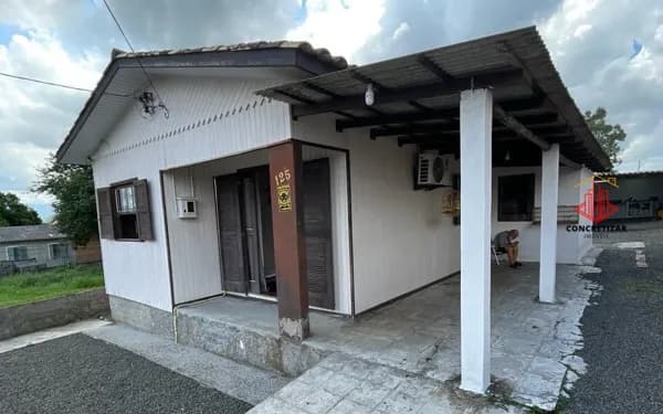 Casa + edícula em rua tranquila
