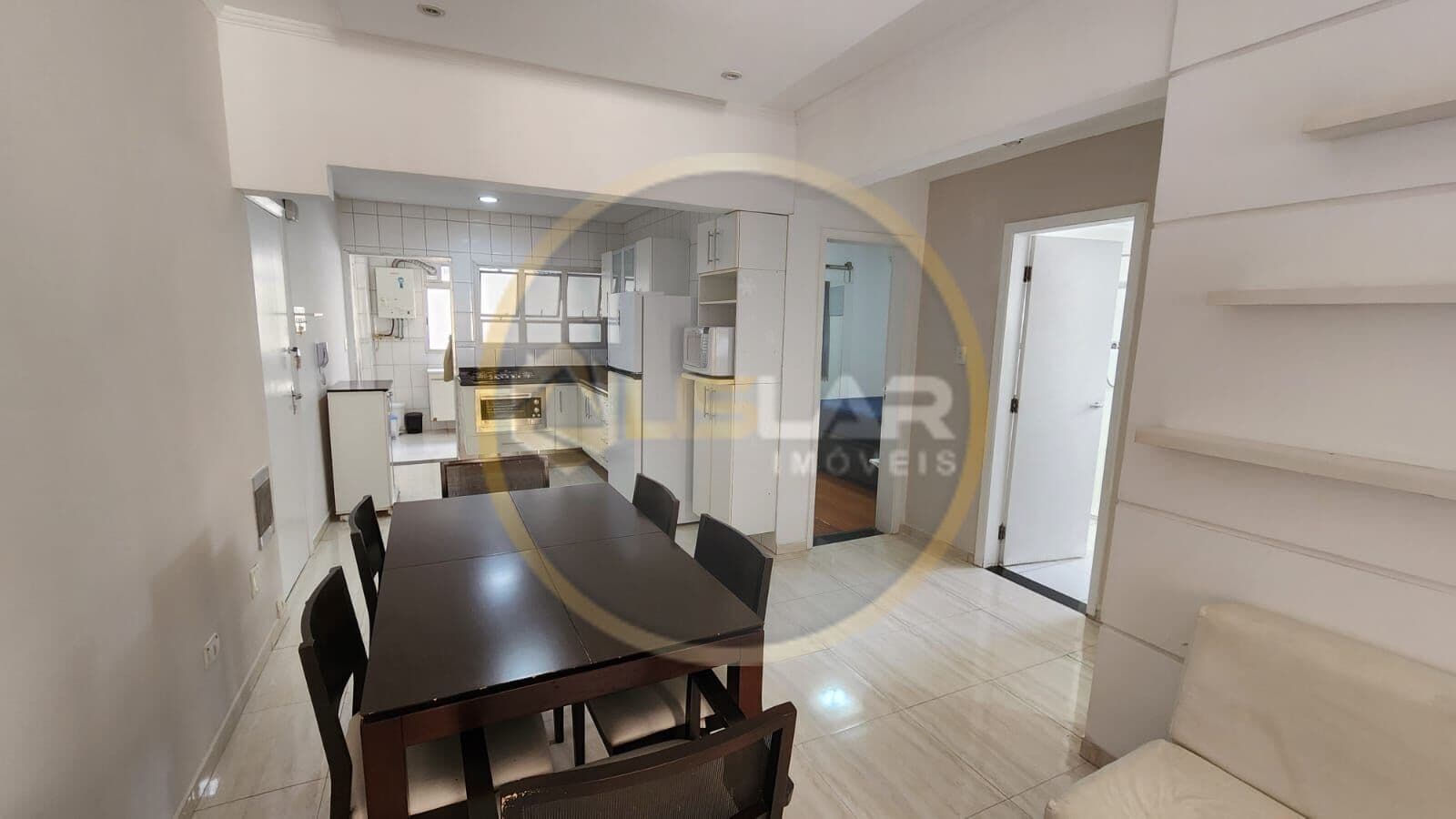 Apartamento de 2 dorms no Gonzaga com sala 2 ambs, vista mar, gar demarcada