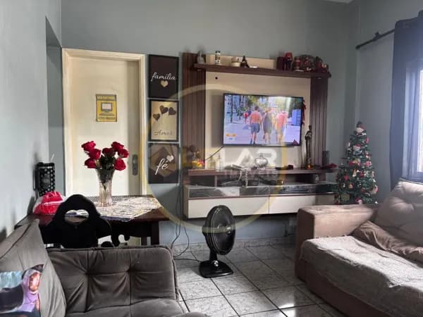 Apartamento de 2 dormitórios com sala 2 ambs ,garagem coberta