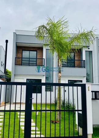Sobrado com 2 Quartos, móveis planejados garagem coberta e linda vista para a Praia da Pinheira